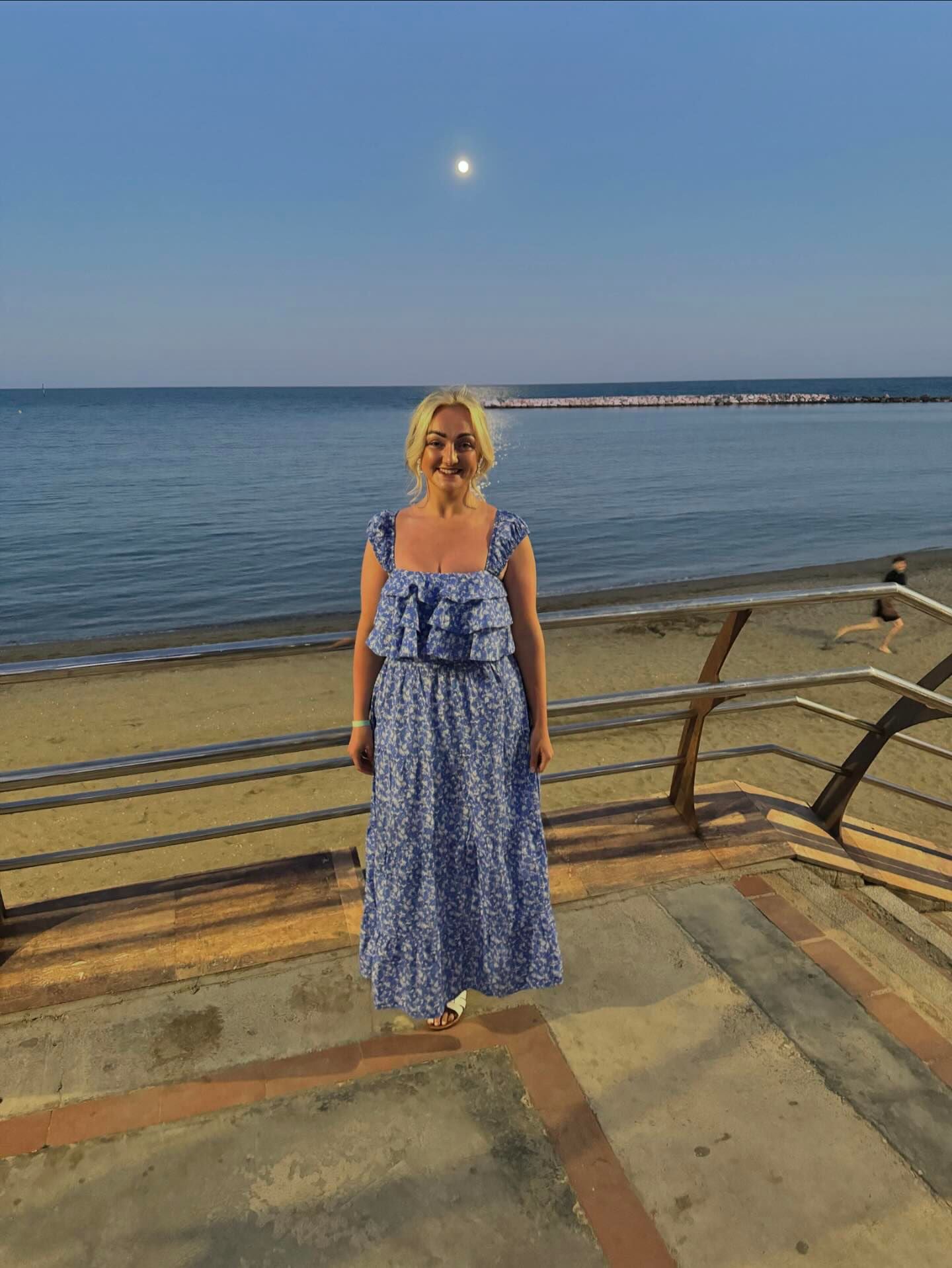 The blue and white floral tiered cotton poplin skirt