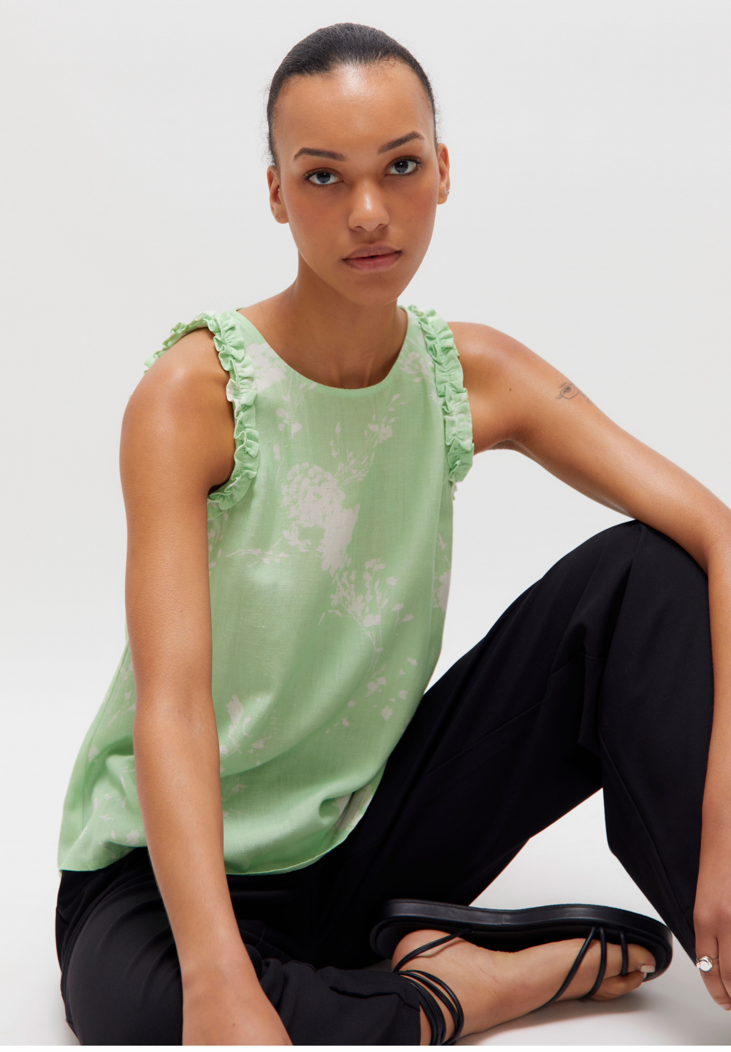 The mint green floral print top