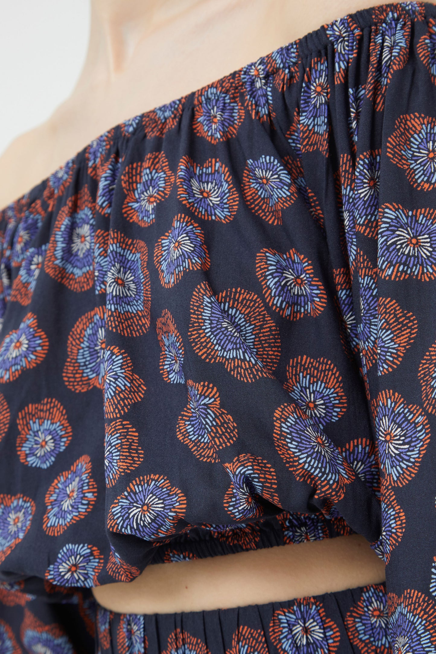 KIM printed off the shoulder top in navy blue