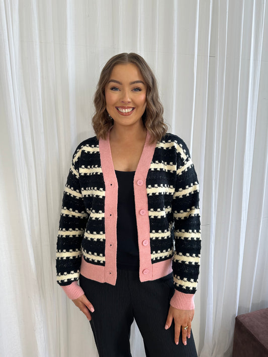 The monochrome cardigan with pink trim detail