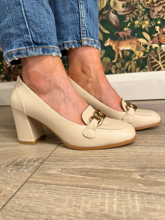 The cream block heel with gold chain detailing