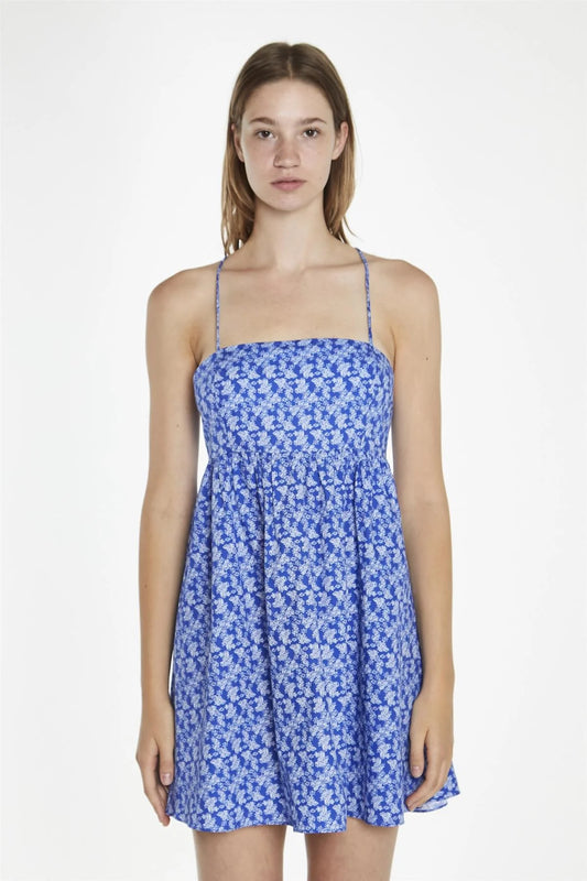 The blue ditsy print babydoll style dress with tie back detail
