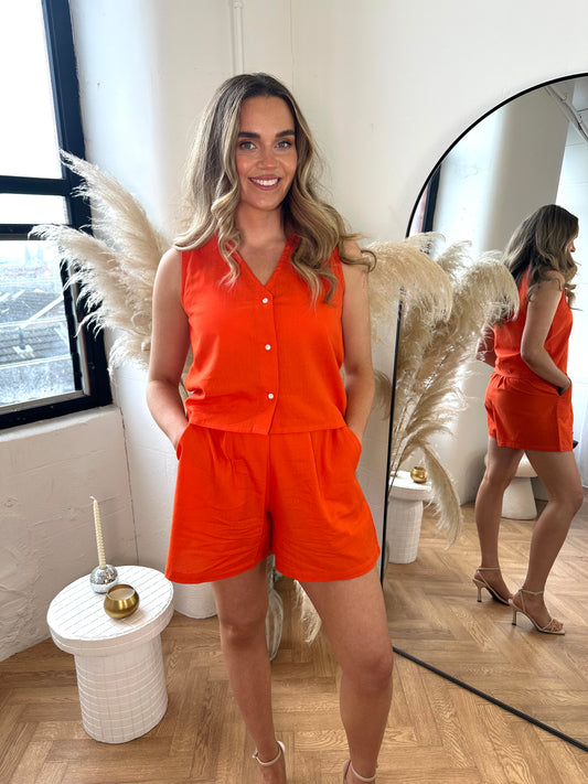 The ARIA orange lightweight waistcoat top