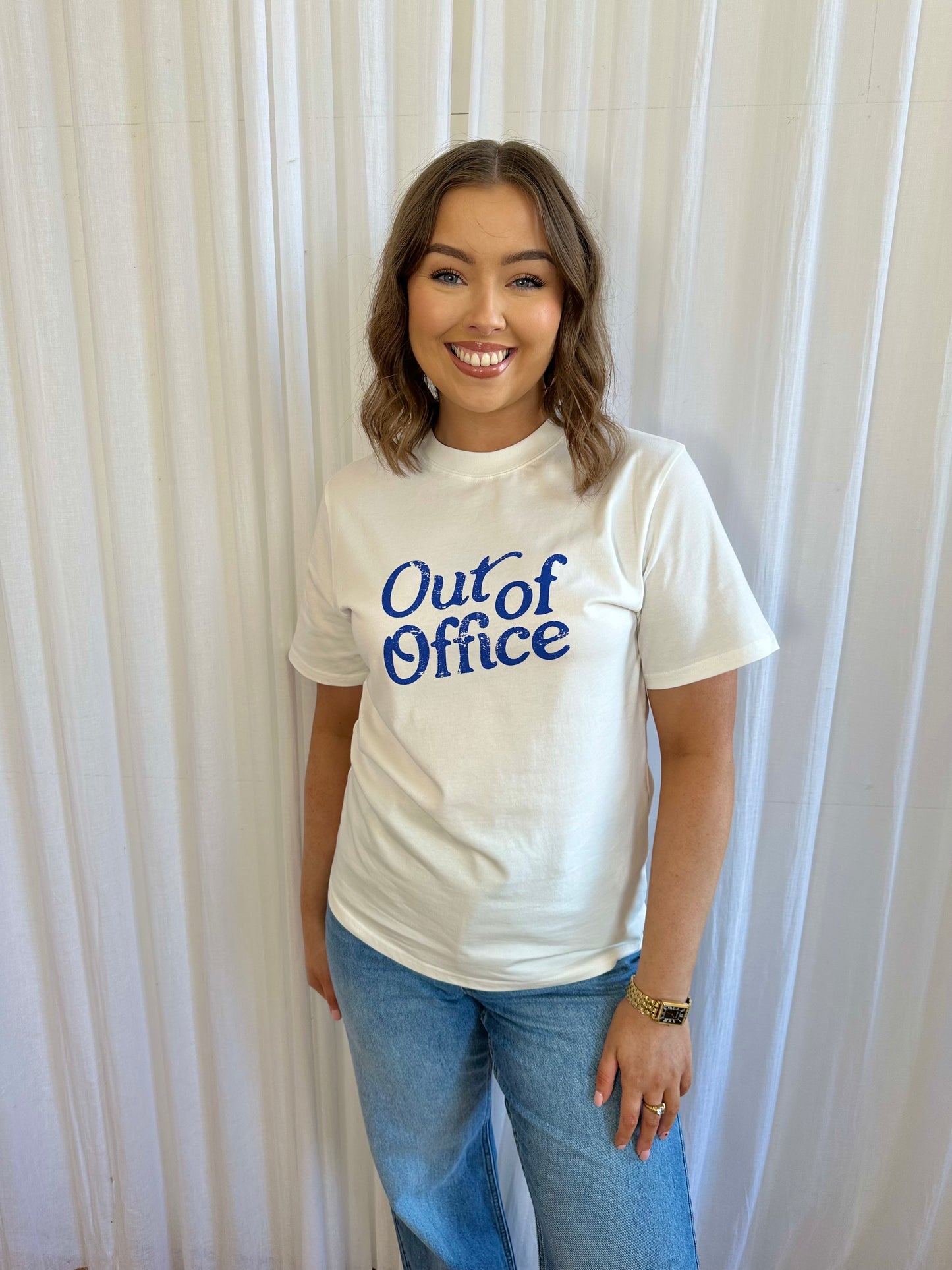 The OUT OF OFFICE white t-shirt with cobalt blue graphic