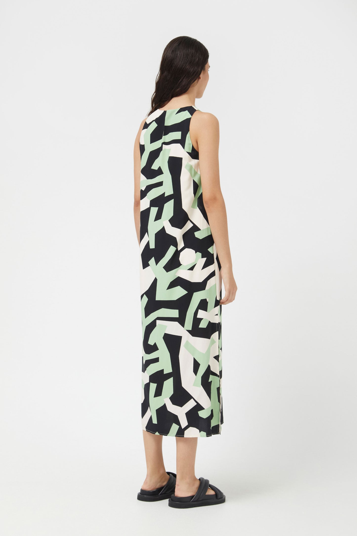 The mint green and black abstract midi dress