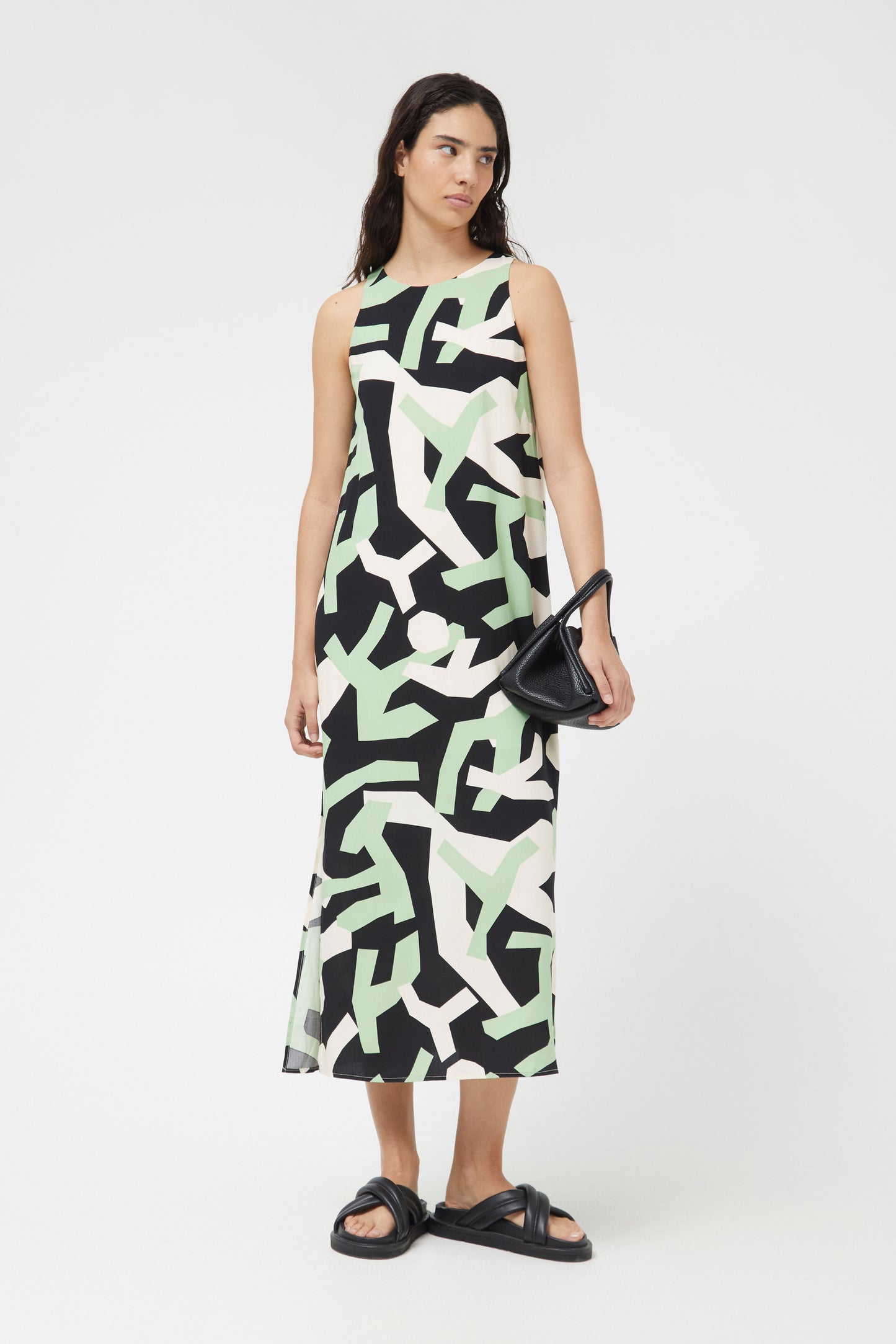 The mint green and black abstract midi dress