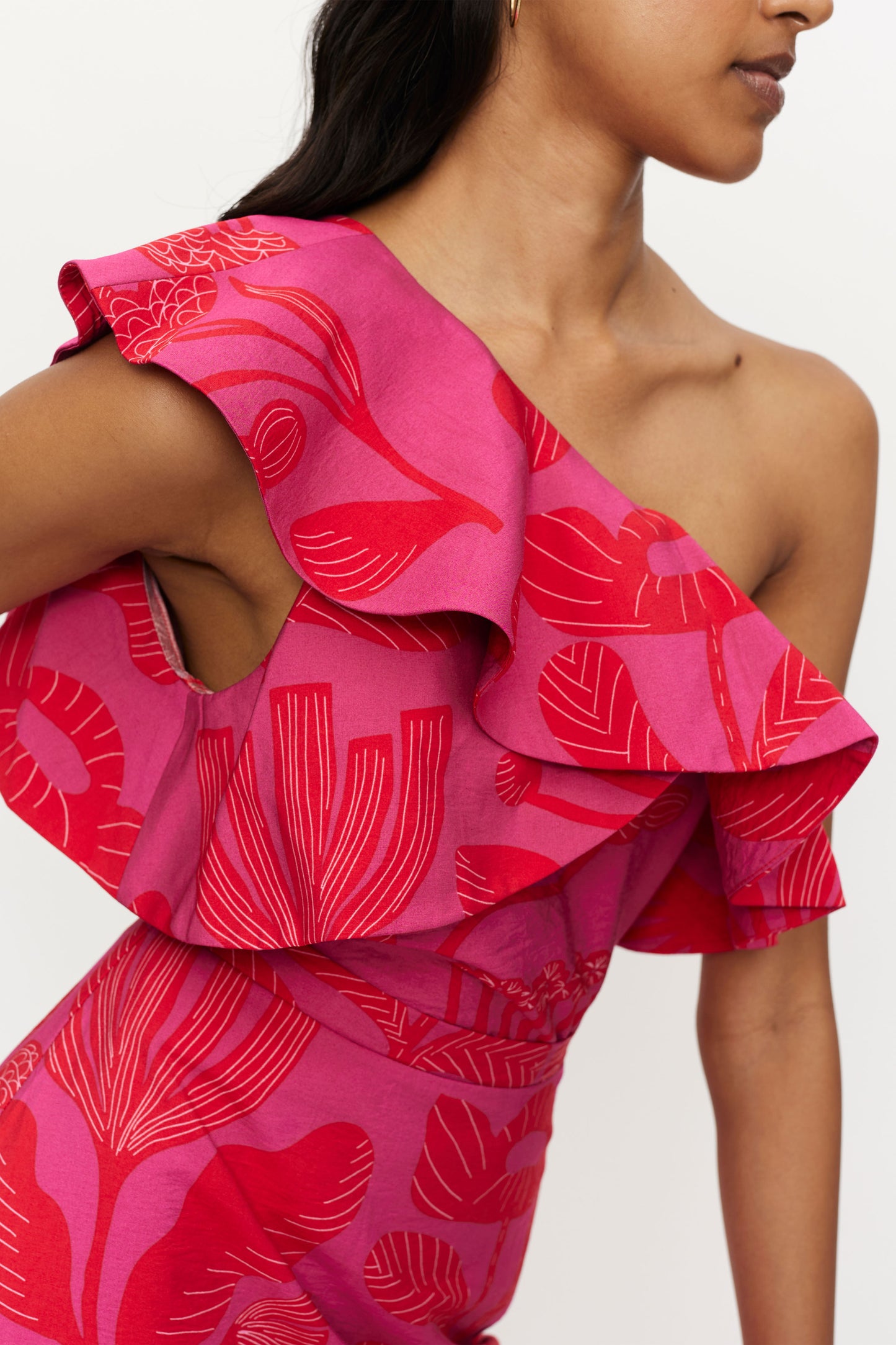 The red and pink one shoulder top