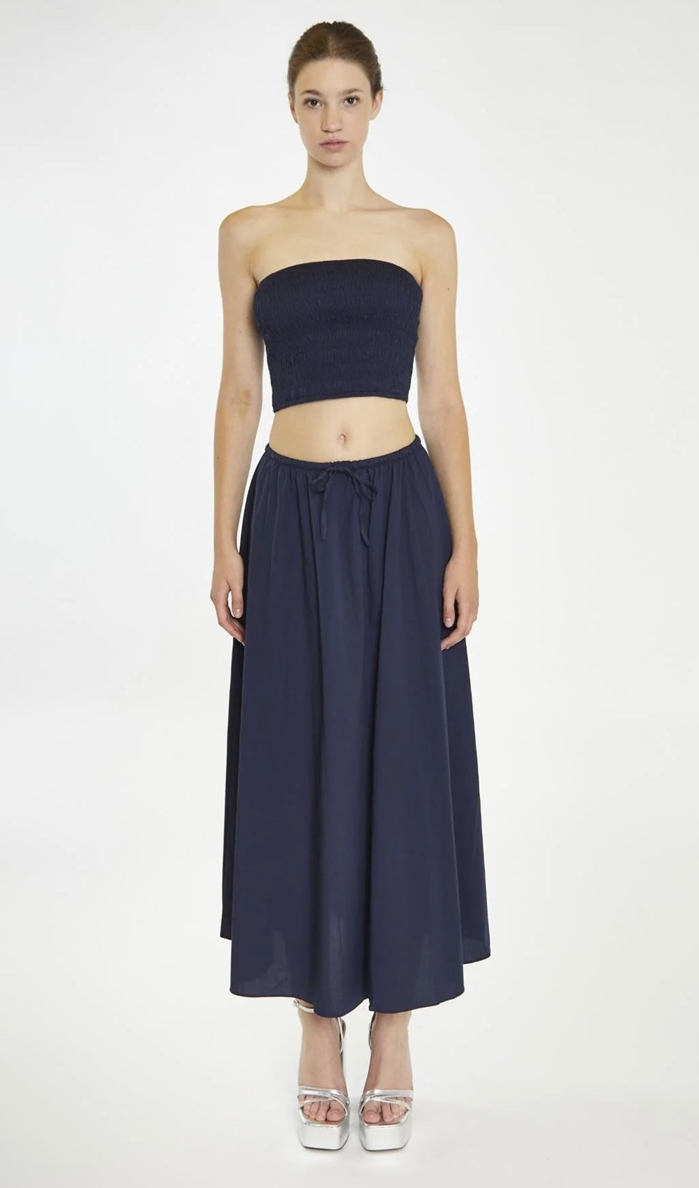 The navy cotton poplin skirt with adjustable waist detail