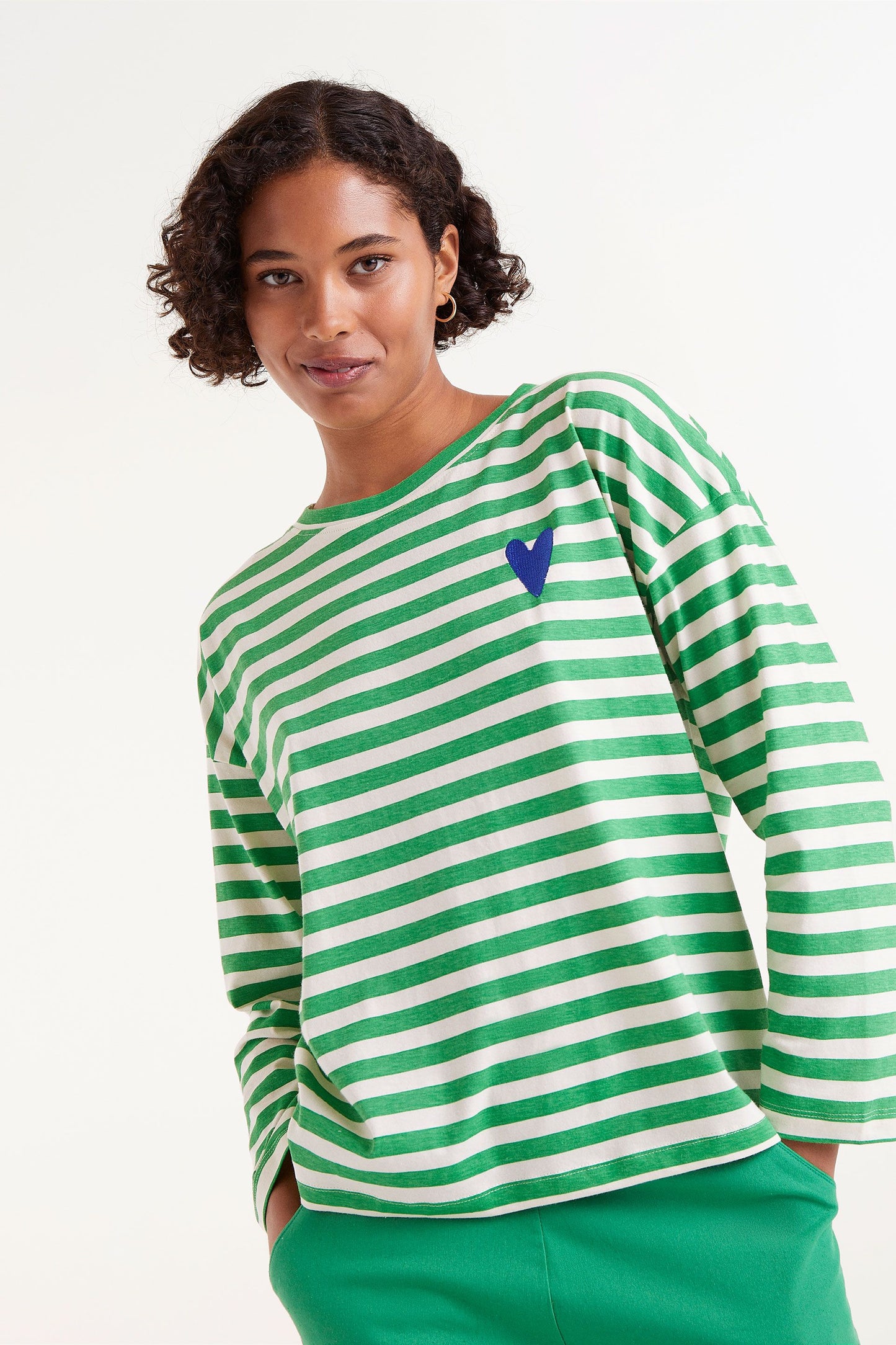 The long sleeve white and green stripe top with heart embroidery detail