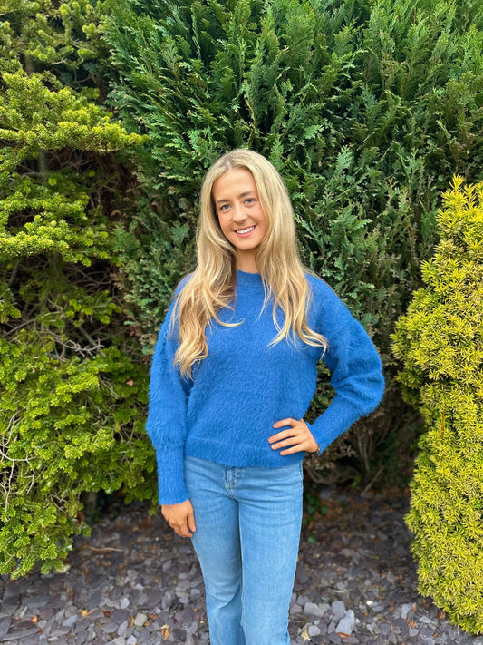 The blue fluffy knit jumper