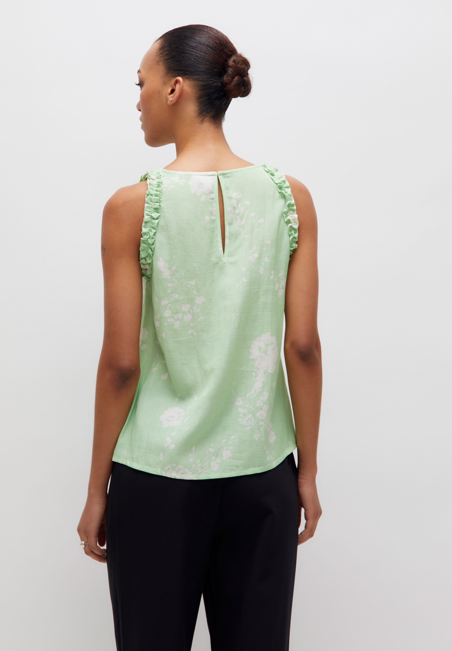 The mint green floral print top